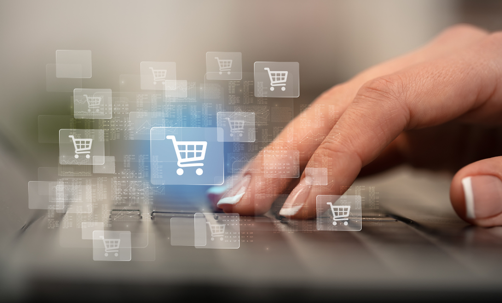 Business woman hand typing on keyboard with online shopping concept-1